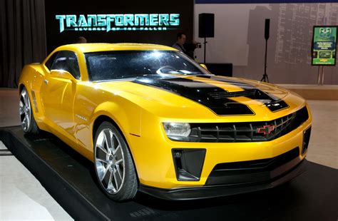 Bumblebee, the lovable yellow and black Autobot, is now a Chevrolet Camaro in the live-action films. Learn how Michael Bay and the filmmakers chose this …